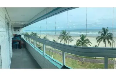 Apartamento 2 dorm - varanda gourmet - pé na areia e vista mar- jardim real - pg