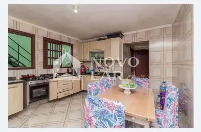 Casa com 6 quartos à venda na Avenida Paulo Pontes, 648, Cavalhada, Porto Alegre por R$ 550.905
