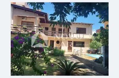 Casa em condomínio fechado com 3 quartos à venda na rua doutor castro de menezes, 857, vila assunção, porto alegre por r$ 1.499.000