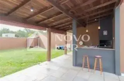 Casa em condomínio fechado com 3 quartos à venda na Rua Derocy Peres da Palma, 121, Lomba do Pinheiro, Porto Alegre por R$ 620.000