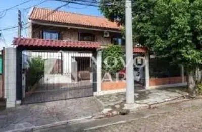 Casa com 5 quartos à venda na rua vinte e um de agosto, 133, cavalhada, porto alegre por r$ 849.000