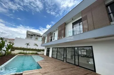 Linda casa de alto padrão com sofisticação e elegância no condomínio mont blanc