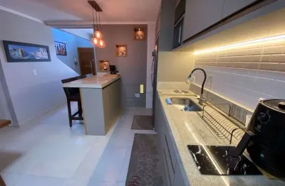 Sobrado geminado com 160m², 2 suítes no bairro gravatá navegantes.