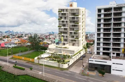 Apartamento 3 suítes frente mar, no centro em navegantes sc.