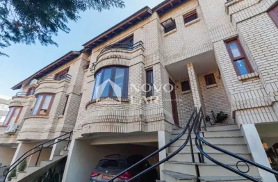 Casa em condomínio fechado com 3 quartos à venda na Rua Curupaiti, 260, Cristal, Porto Alegre por R$ 749.000