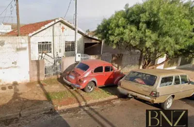 Terreno com duas casas no quintal para venda no jardim coroados