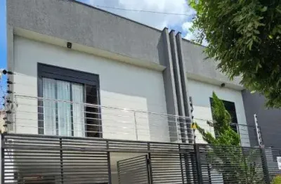 Sobrado Alto Padrão em Sarandi com 4 suítes, energia solar, acabamento moderno e 202m² de conforto!