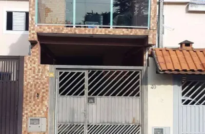 Sobrado à venda no Jardim Vila Carrão com 2 quartos varanda com área gourmet 2 vagas de garagem.