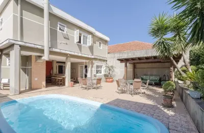 Casa com 3 quartos à venda na Rua Engenheiro Roberto Símonsen, 112, Petrópolis, Porto Alegre por R$ 2.000.000