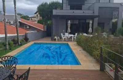Casa com 4 dormitórios à venda, 296 m² por R$ 2.380.000,00 - Caminhos de San Conrado - Campinas/SP