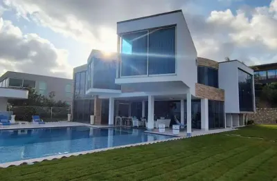 Casa alto padrão, vista mar espetacular, 1105,28m2, Condomínio Horizonte Fênix