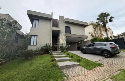 Casa com 500m², 4 suítes e 4 vagas de garagem, disponível para locação no Condom