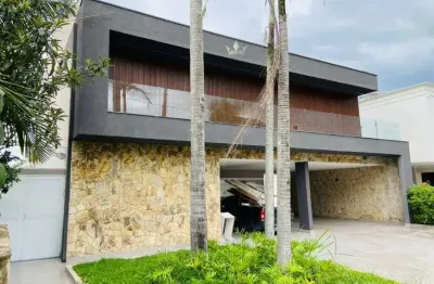 Casa em condomínio fechado com 4 quartos para alugar no Alphaville Residencial Dois