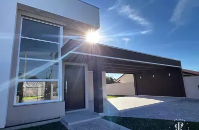 Casa nova com pé direito alto e 3 dormitórios no centro de Imbé/RS