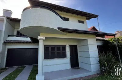 Excelente sobrado 4 dormitórios a poucos metros do mar em Imbé-RS