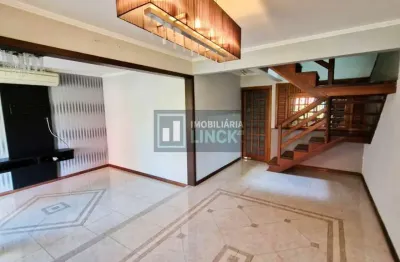 Casa em condomínio fechado com 4 quartos à venda na Avenida Juca Batista, 1490, Cavalhada, Porto Alegre por R$ 950.000