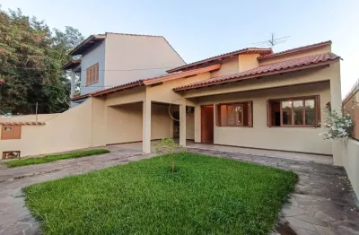 Casa à venda em Canoas, São Luis, com quintal e churrasqueira Venda: R$ 690.000,00
