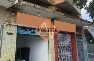 Prédio comercial e residencial com 02 salões comerciais e 03 casas residenciais, 300m², R$ 1.300.000,00.