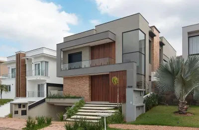 Casa em condomínio nova de 480m² com 4 dorms no genesis i á venda