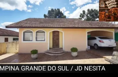 Casa com 3quartos sendo um deles suite, sala de jogos , amplo terreno