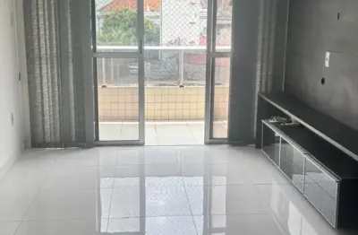 Apartamento para locação com 75,72m² de área privativa, com móveis planejados e ambientes climatizados na sala e nos quartos.