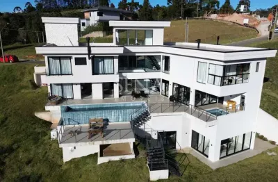 Casa com 5 quartos à venda na Rua Baby Florence, Alto do Capivari, Campos do Jordão