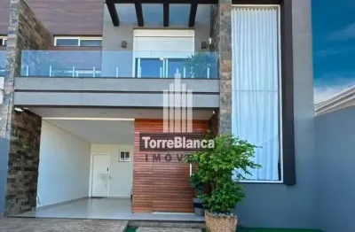 Sobrado à venda, 3 dormitórios (1 suíte), cozinha planejada, área gourmet e 2 vagas de garagem