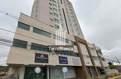 Apartamento semi-mobiliado à venda – 2 quartos (1 suíte), sacada com churrasqueira e garagem, próxi
