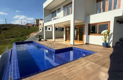 Imóvel de luxo em condomínio exclusivo em Cotia-SP: 3 quartos, 3 suítes, 3 salas, 2 banheiros, 3 vagas, 864m²!