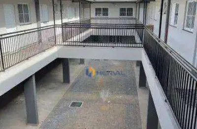 Prédio com 15  kitnets, 2 salas comerciais e 16 garagens