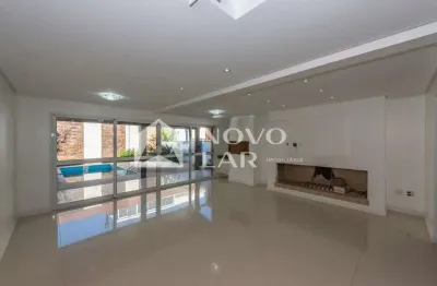 Casa em condomínio fechado com 3 quartos à venda na Rua Dolores Duran, 1584, Agronomia, Porto Alegre por R$ 1.390.000