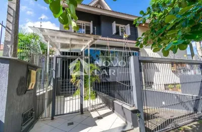 Casa com 4 quartos à venda na Rua João Paetzel, 1060, Chácara das Pedras, Porto Alegre por R$ 1.400.000