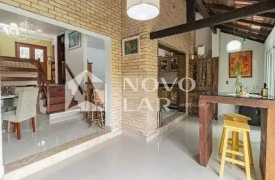 Casa com 3 quartos à venda na Rua Homero Só Jobim, 144, Ipanema, Porto Alegre por R$ 1.100.000