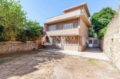 Casa com 4 quartos à venda na Rua Matias José Bins, 410, Três Figueiras, Porto Alegre por R$ 1.900.000