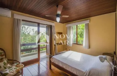 Casa com 3 quartos à venda na Rua Luiz Voelcker, 534, Três Figueiras, Porto Alegre por R$ 2.400.000
