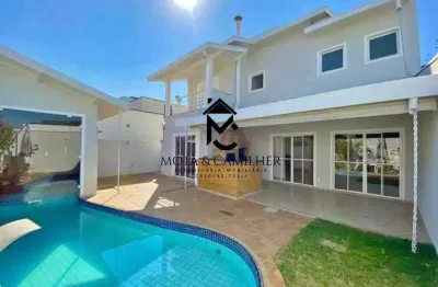 Casa em condomínio com piscina aquecida disponível para venda e locação.