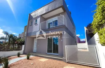 Casa em condomínio fechado com 3 quartos à venda na Rua Wilma Perpétuo, 50, Mário Quintana, Porto Alegre por R$ 787.000