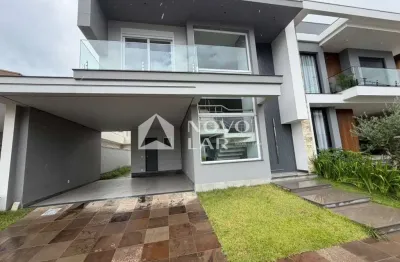 Casa em condomínio fechado com 3 quartos à venda na Rua dos Pinheiros, 141, Igara, Canoas por R$ 1.980.000