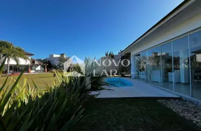 Casa em condomínio fechado com 3 quartos à venda na Avenida Homero Ribeiro, 361, Remanso, Xangri-Lá por R$ 1.500.000