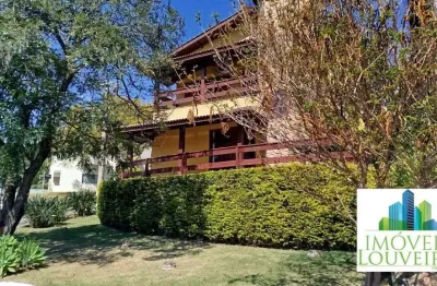 Casa com 3 dormitórios à venda, 283 m² por R$ 1.590.000,00 - Condomínio Villagio Capriccio - Louveira/SP