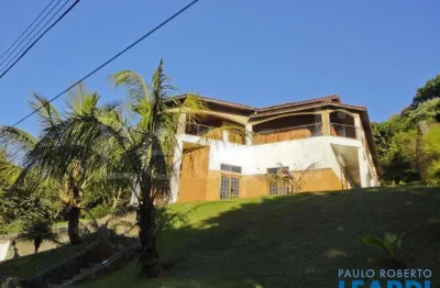 Casa em condomínio fechado com 5 quartos à venda na Rua Xavantes, Tarumã, Santana de Parnaíba