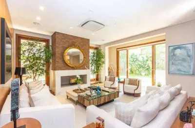 Sobrado 950 m² com 4 suites, 10 vgs, em condominio cidade jardim.