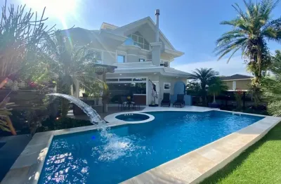 Casa de 5 quartos sendo suítes em jurerê internacional