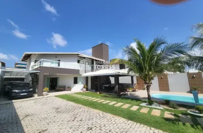 Casa duplex a venda de 4 suítes e garagem em cond. fechado em buraquinho