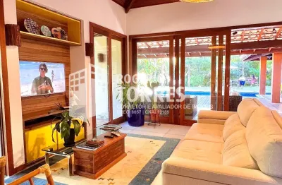 Casa a venda de 4 suítes, com sistema energia solar, área gourmet com churrasqueira e piscina e 3 garagens na praia do forte  - bahia