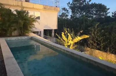Casa em condomínio fechado com 4 quartos para alugar na Rua Caraíva, Abrantes, Camaçari