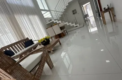 Cód. 560 alphaville litoral norte 1 casa com 4 suítes e piscina com cascata