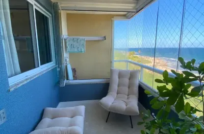 Apartamento a venda de 2/4, 1 suíte, pé na areia, porteira fechada e 2 garagens em itapuã, salvador.