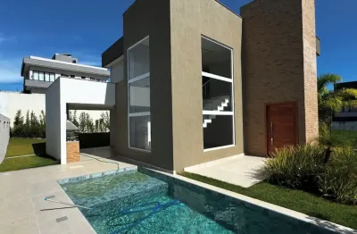 Casa Alpahville Litoral Norte 3 - Casa nova, com acabamento de alto padrão.