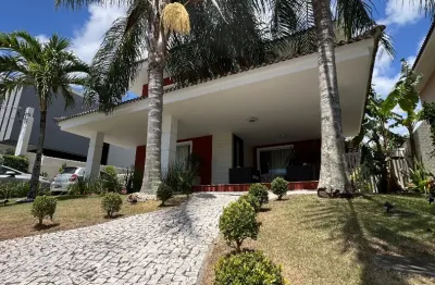 Casa a Venda no Alphaville Litoral Norte 1 - Casa duplex, nascente total, com 4 suítes.